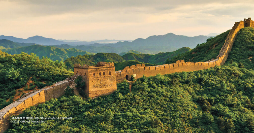 Great Wall of China stretching across lush green hills under a golden sky, symbolizing immersive cultural exploration for National Geographic Expeditions.